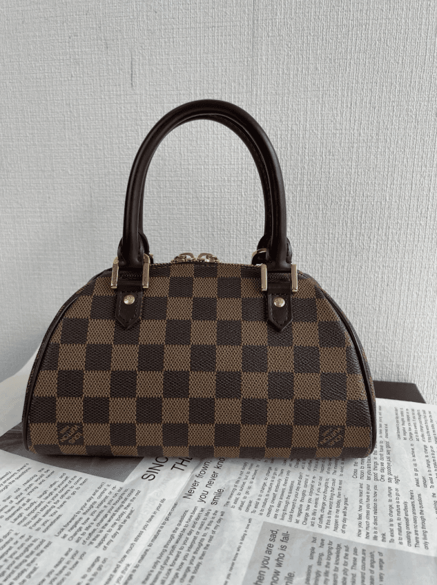Louis Vuitton Damier Ebene Riviera Handbag Brown - Image 1